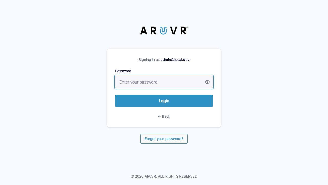 The password step showing the Signing in as label, password input with eye icon, Login button, and Back link
